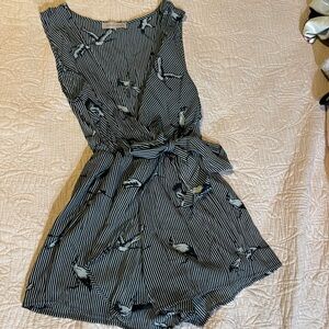 Sleeveless Black & White Striped Bird-Print Romper with Tie Waist